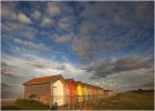 'Beach Huts At Sunset' by John Thompson ARPS EFIAP CPAGB 
